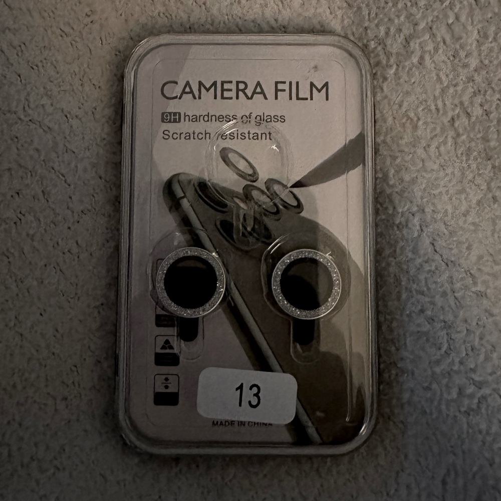 , shiny, stands out and is so pretty especially in the sun. Fits on iPhone 13
